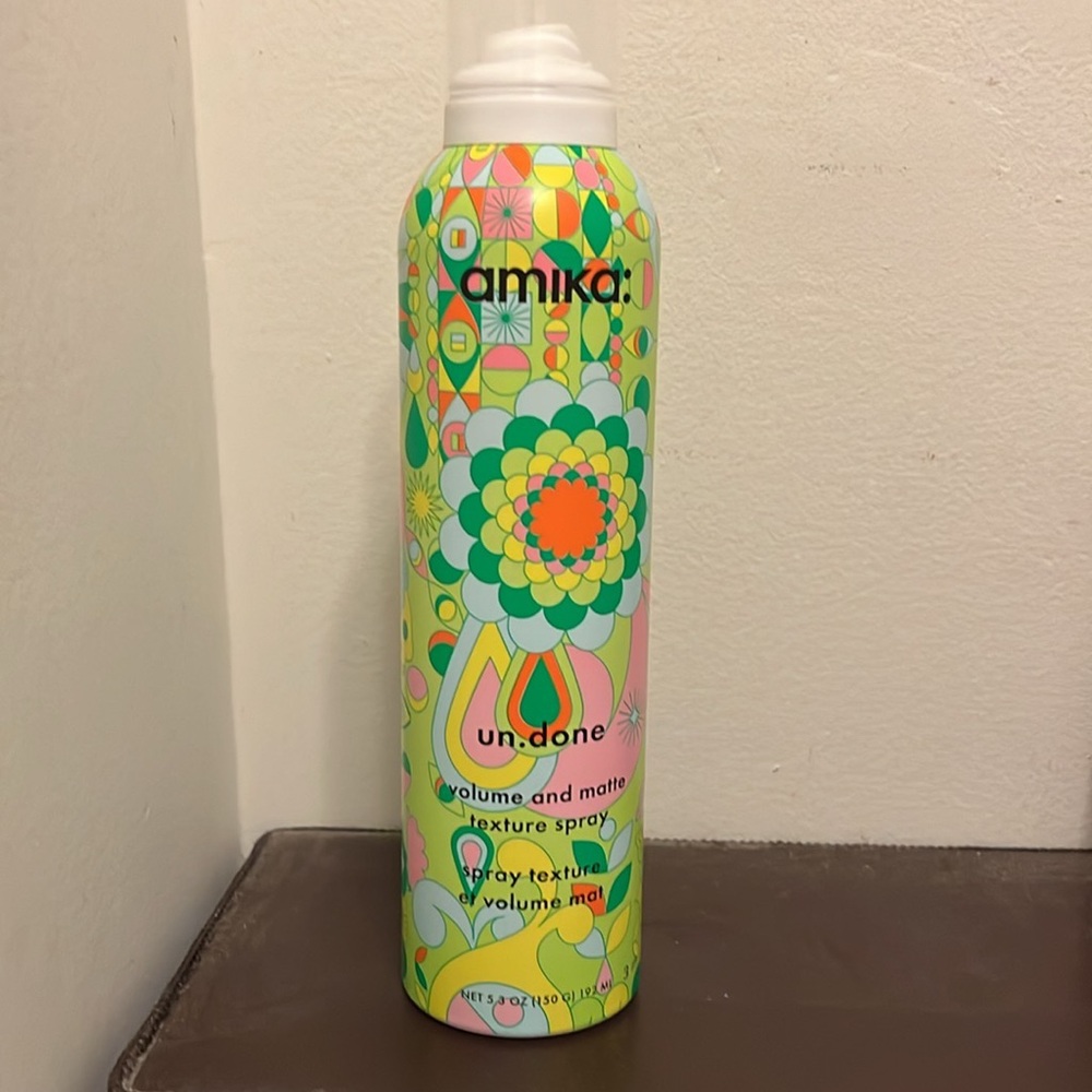 Amika un.done textured hair spray
